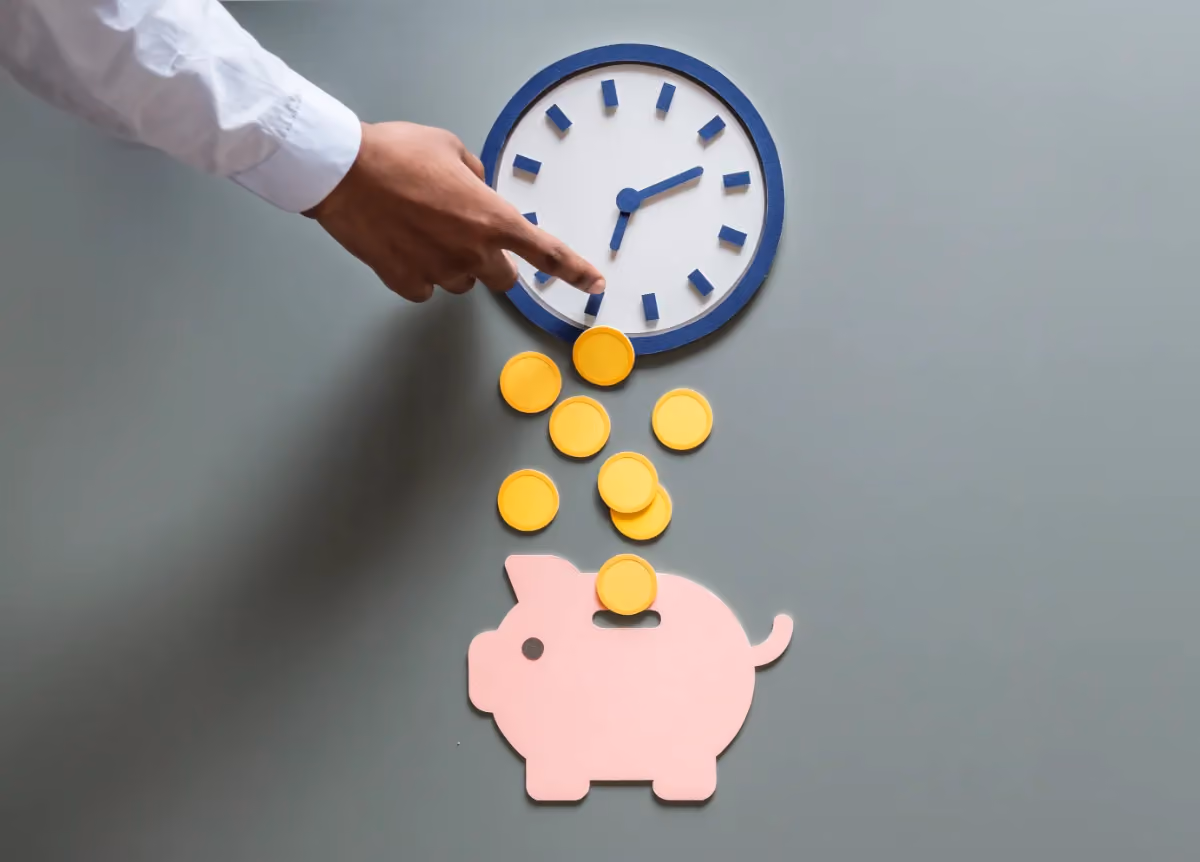 Man filling up piggy bank