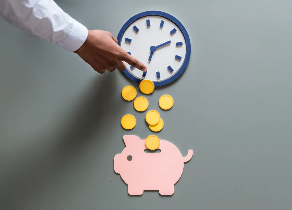 Man filling up piggy bank
