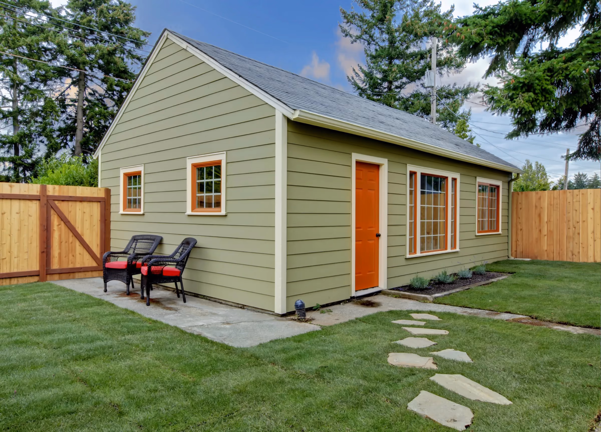 An image of a house with nice green lawn