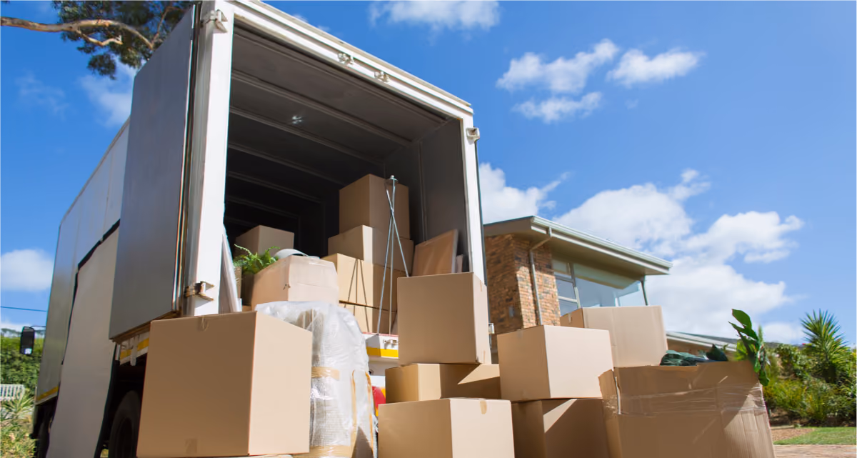 The back of a moving van filled with boxes