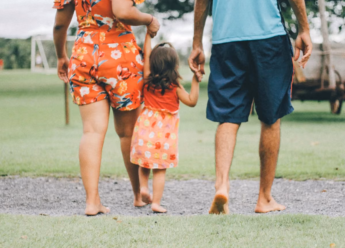 Parents walking with toddler