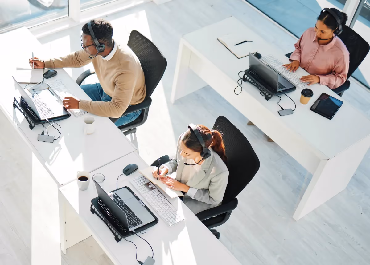 People at desks in office