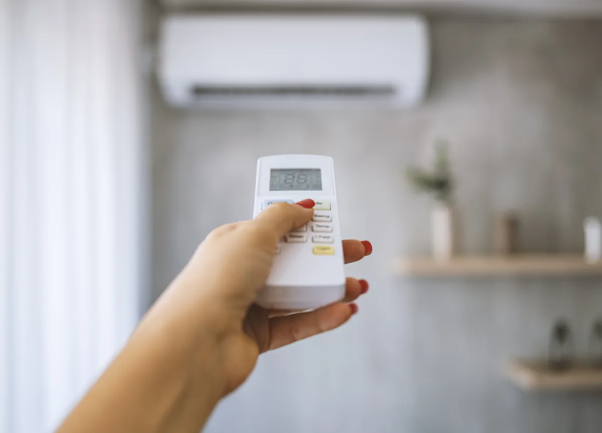 Person using an AC unit