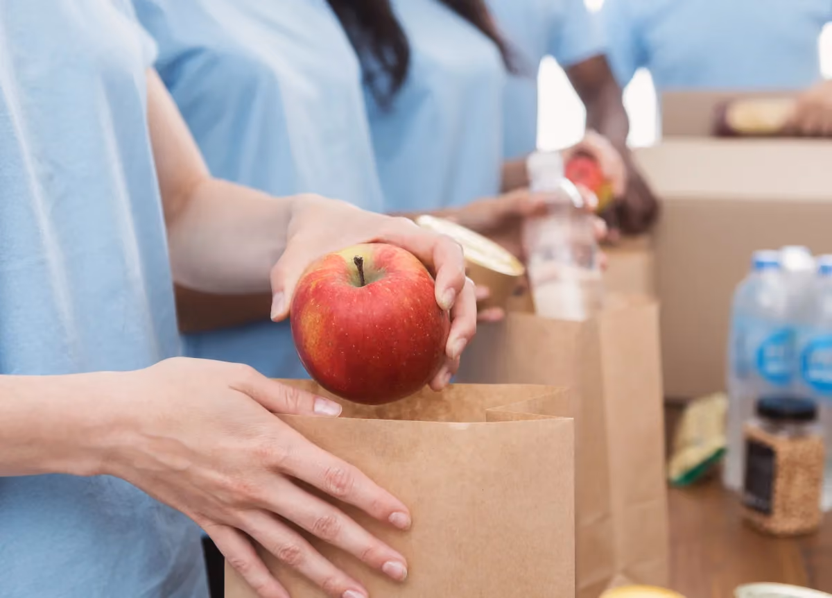 Volunteers sorting donated food