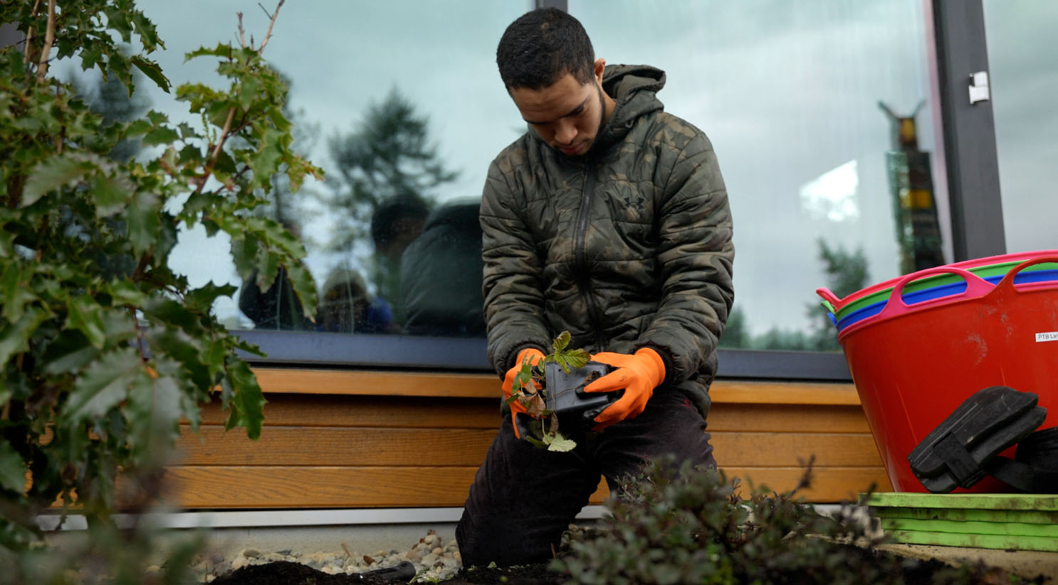 A Job Journey participant landscaping
