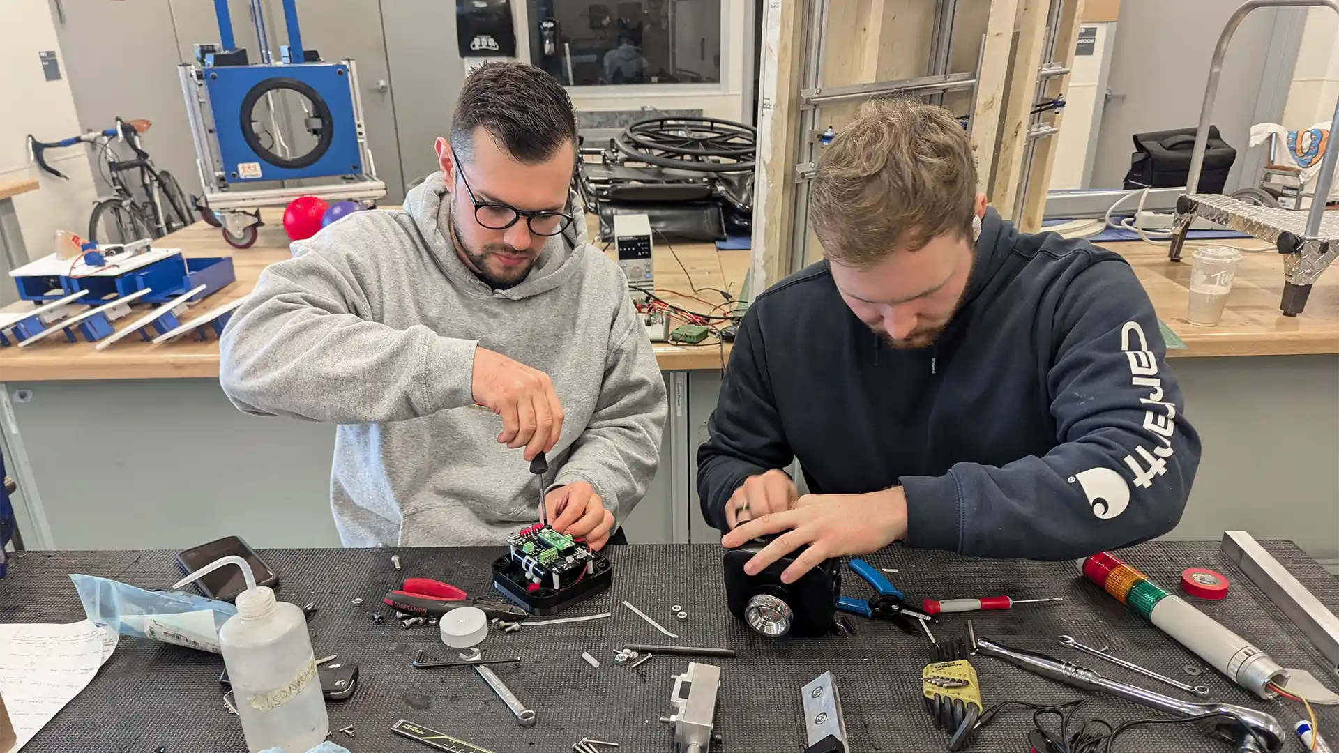 CanAssist engineering co-ops working in the shop