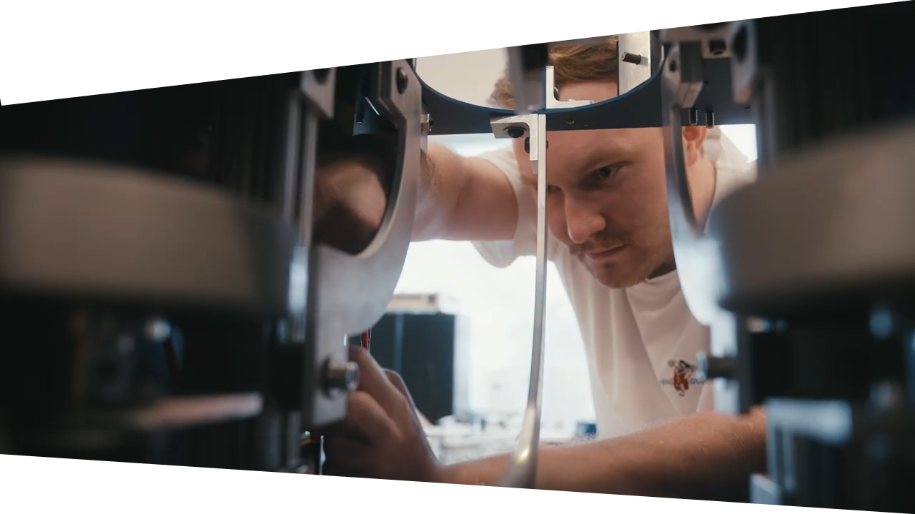 A focused CanAssist co-op working in the shop