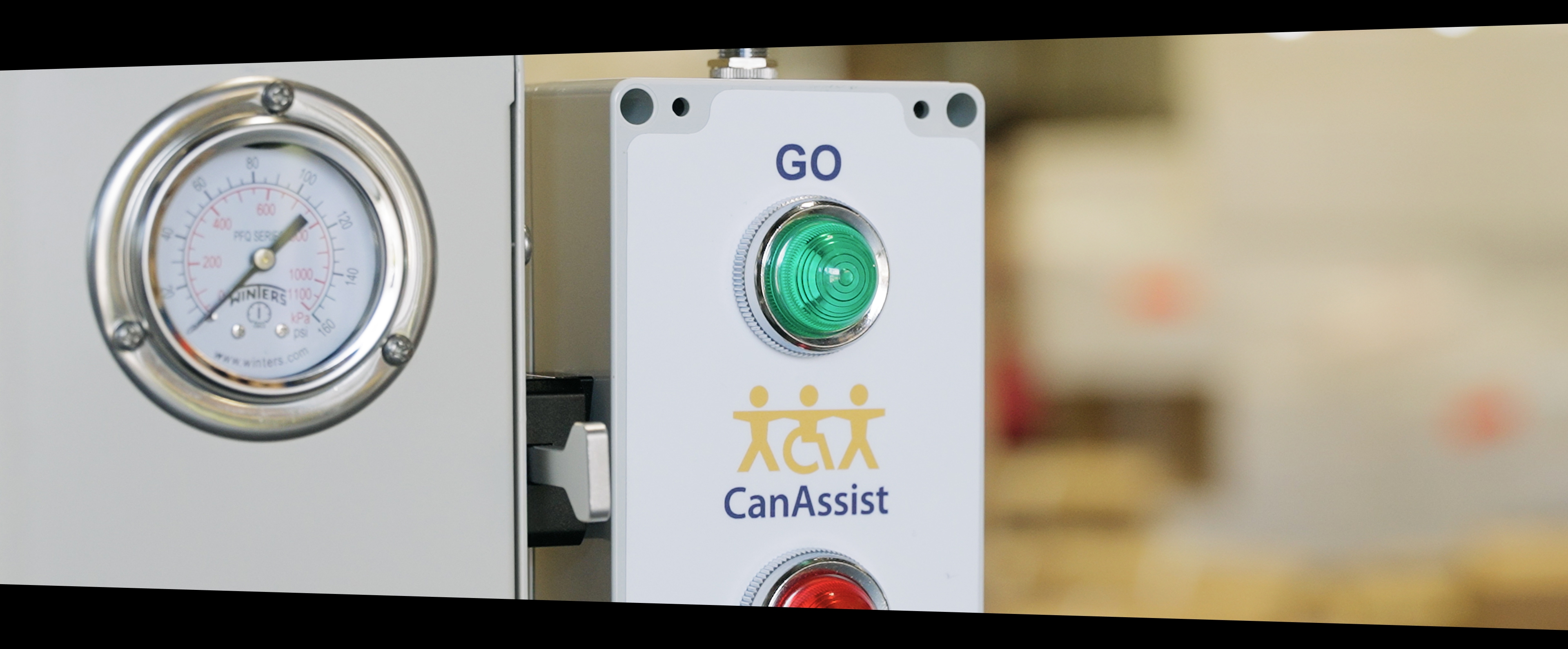 A button that reads go, on CanAssist's gelpack filling assistive technology
