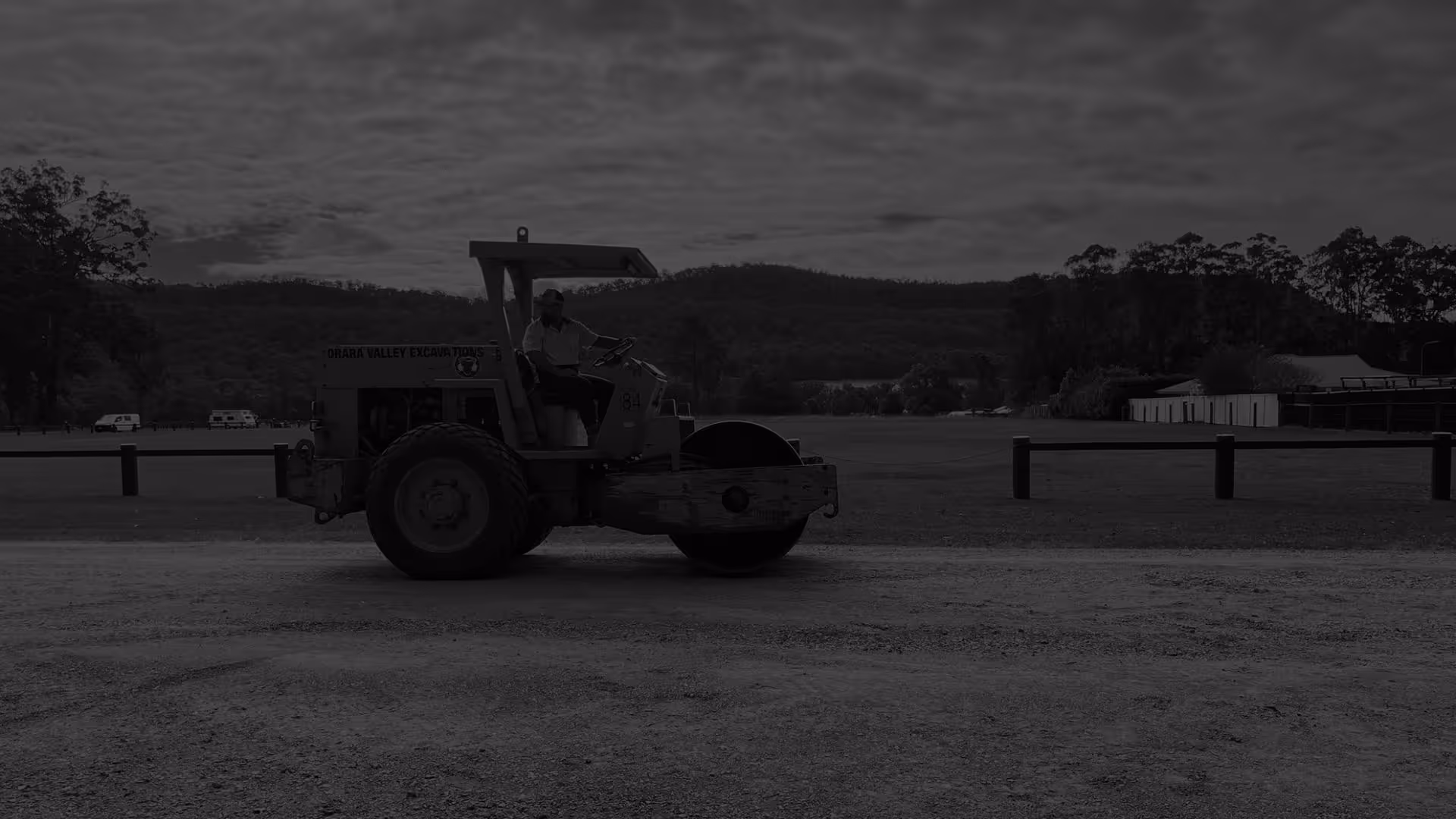 Drum roller machine parked on a road