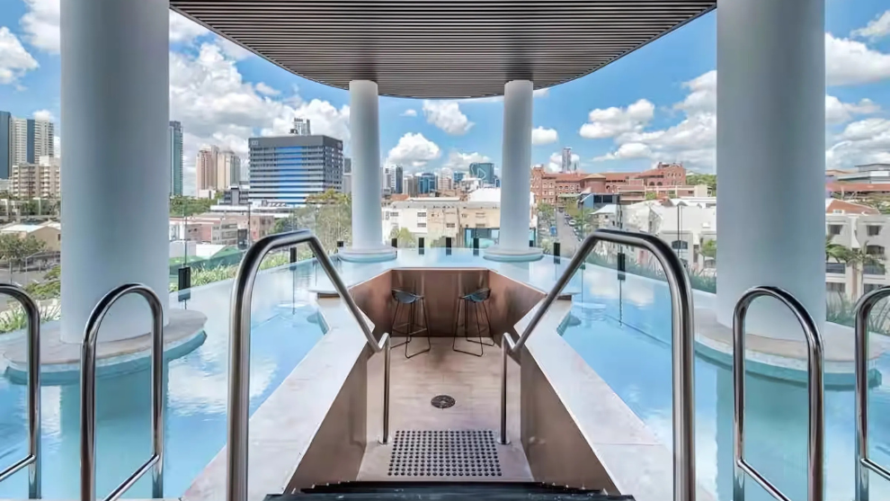 Brisbane Airbnb management apartment with luxury plunge pool access and elevated city views — perfect for urban relaxation.