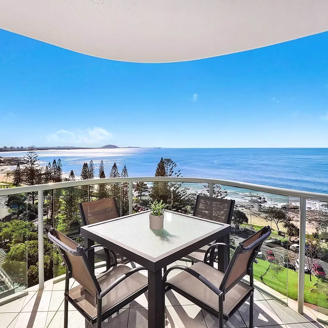 Sunshine Coast Airbnb management balcony with panoramic ocean views and outdoor dining — perfect for relaxing coastal stays.