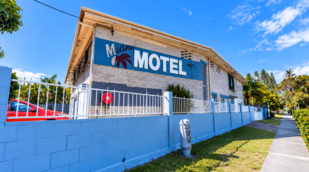Miami Motel exterior before renovation