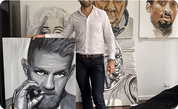 A photo of man while stand the photos of art of man's.