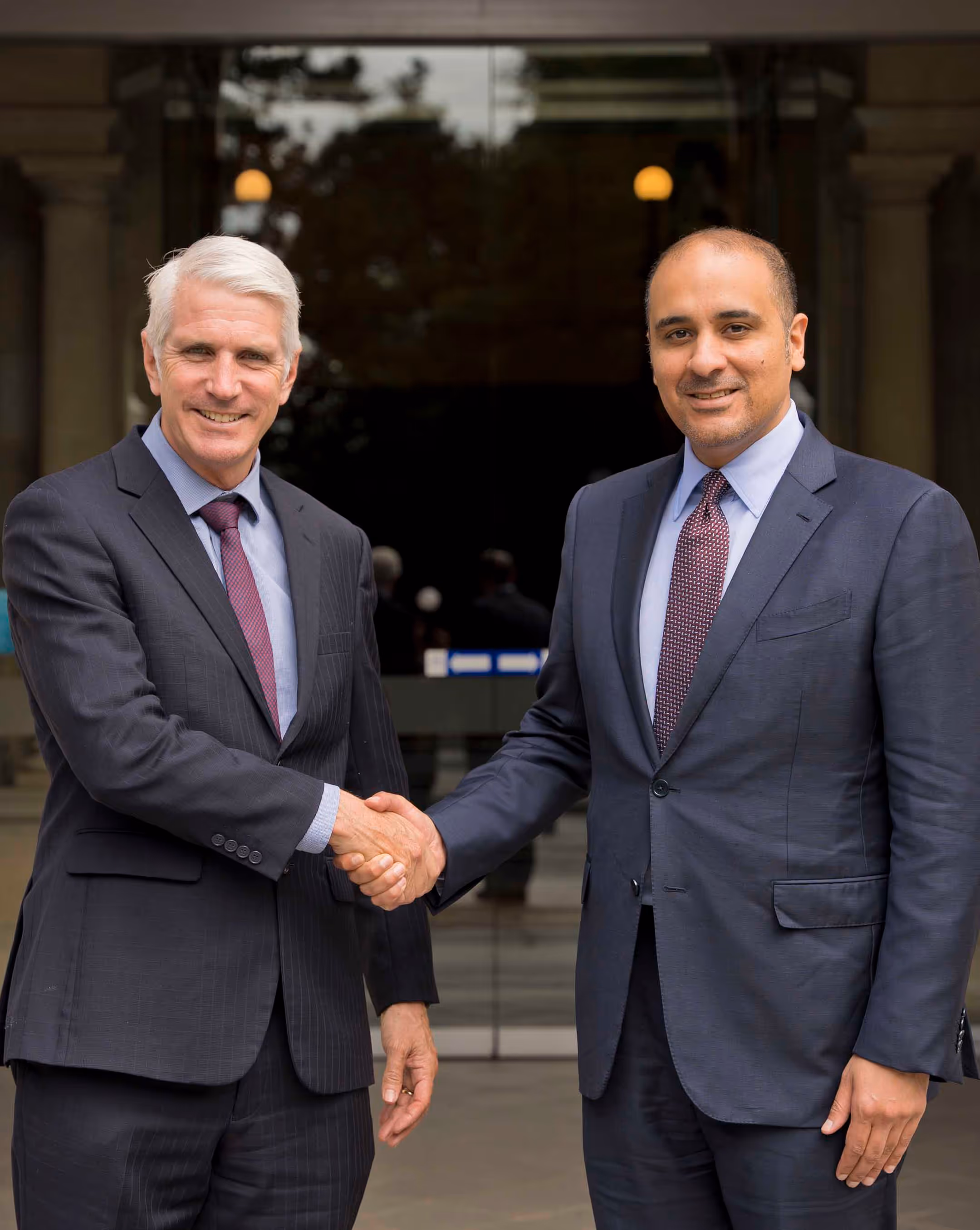 Executive handshake sealing a business deal, captured for motivational corporate content.