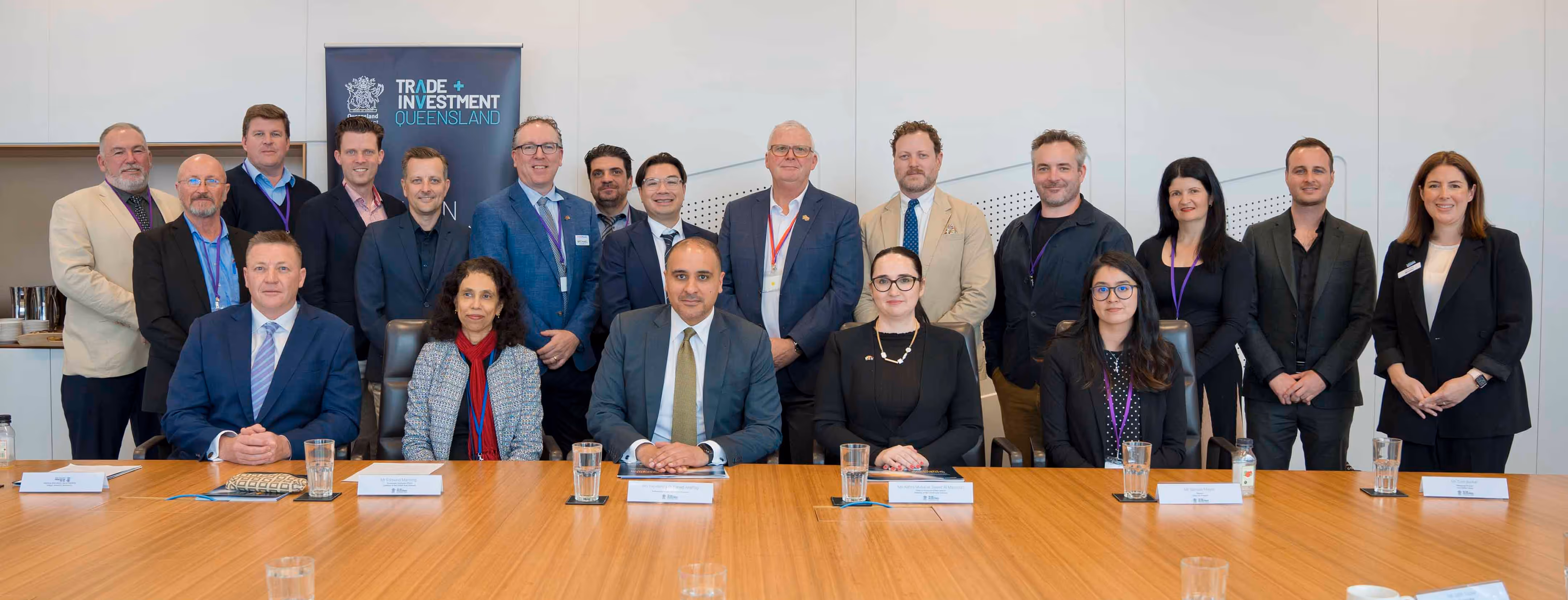 A group photo of the whole team in the meeting room.