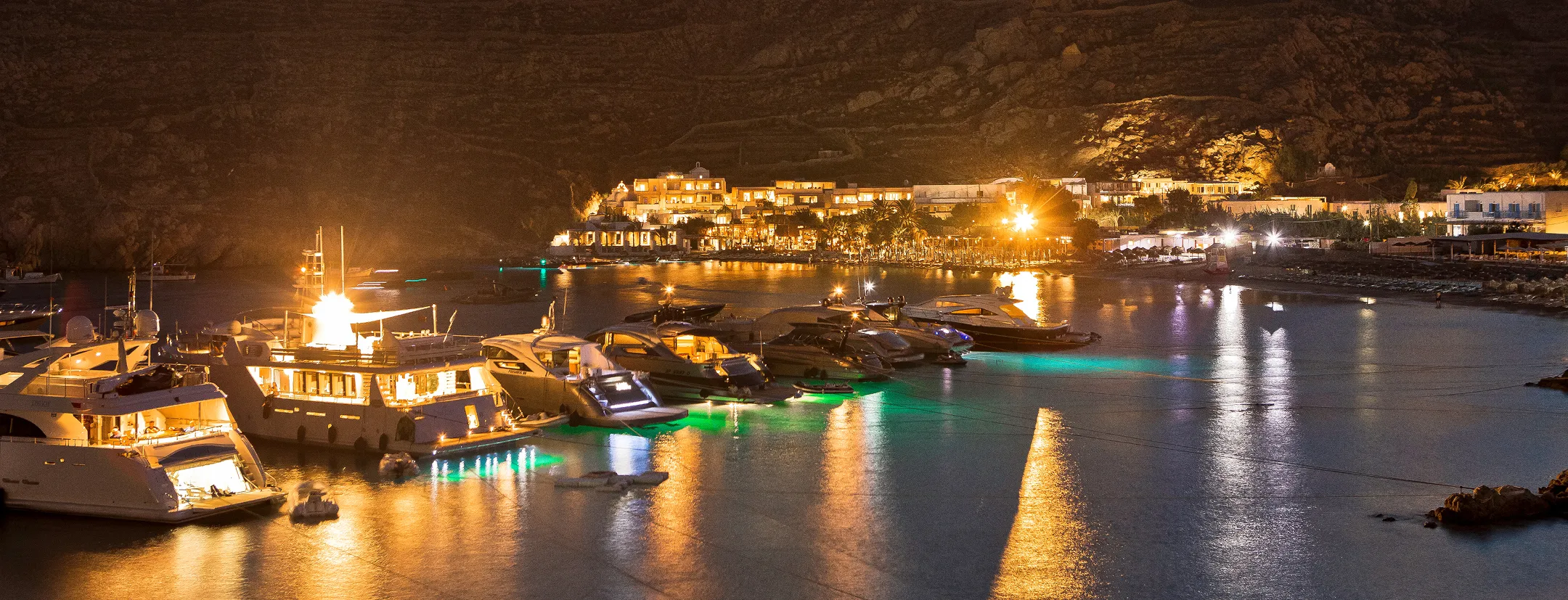 A Beautiful view of a sea while showing the boats.