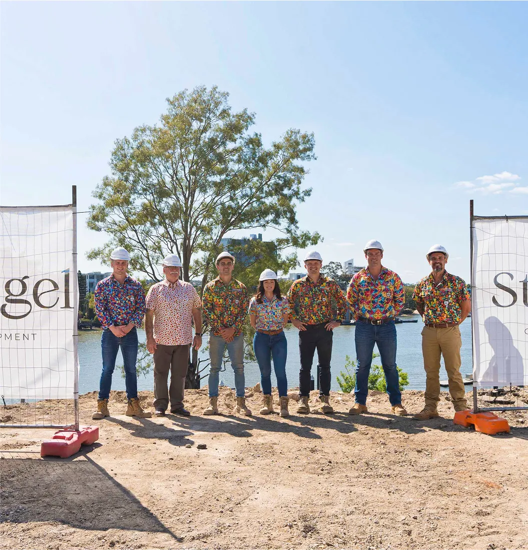 A team photo while stand on the community door.