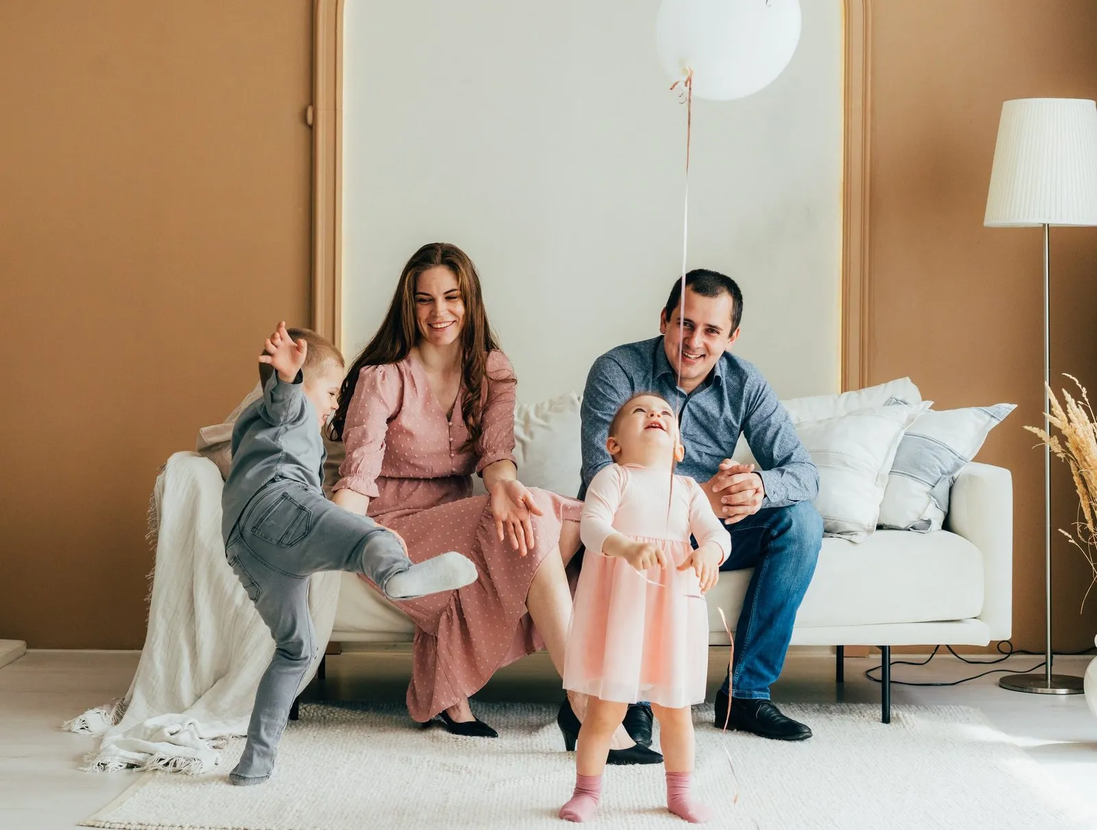 a man and woman with children