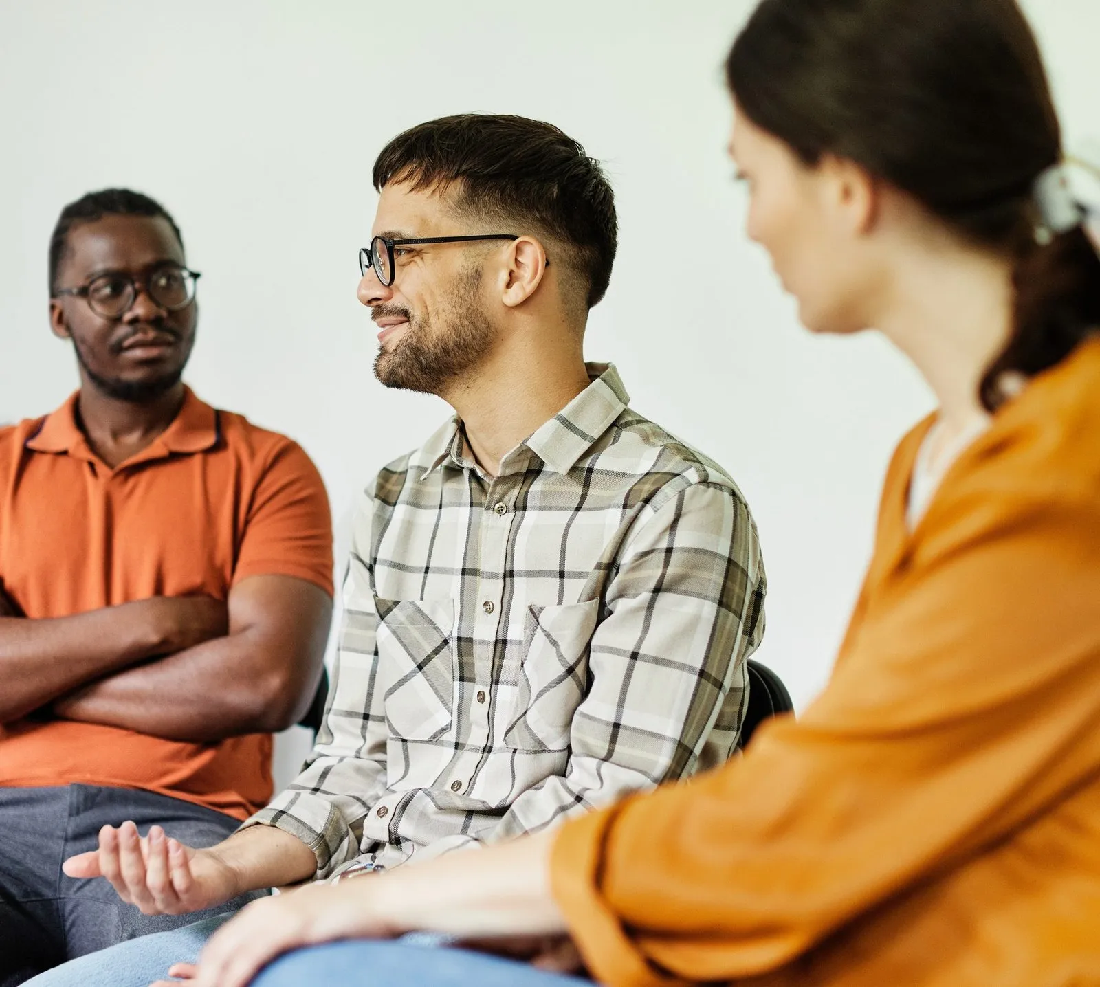 a group of people sitting in chairs