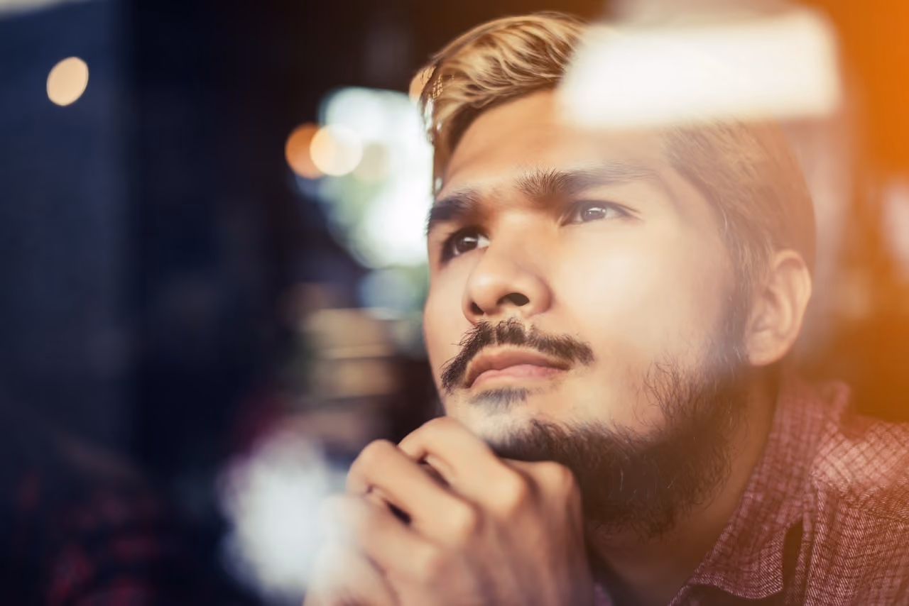 Photo of person looking off into the distance
