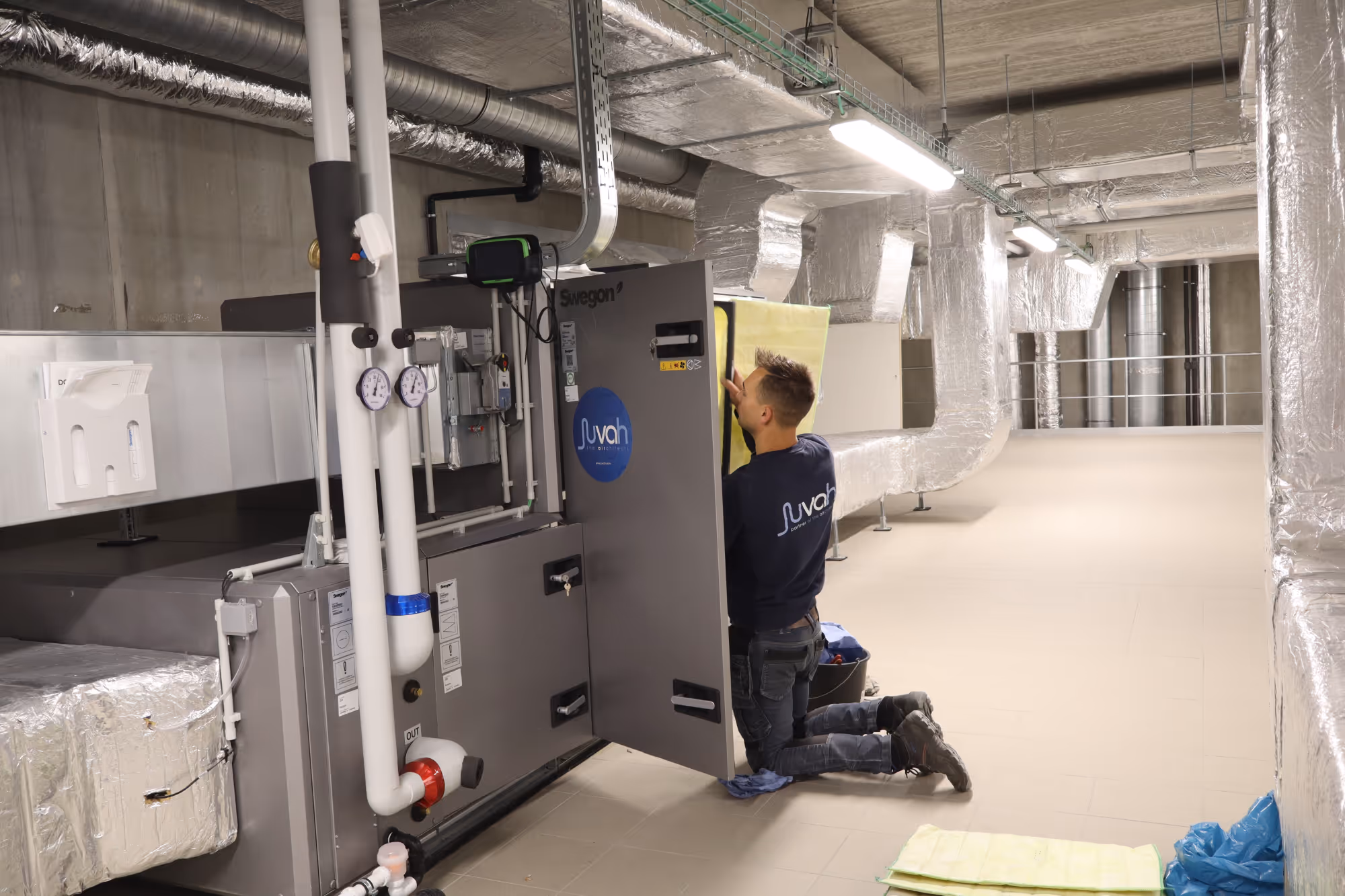 Een onderhoud van een ventilatiesysteem wordt uitgevoerd door Juvah.