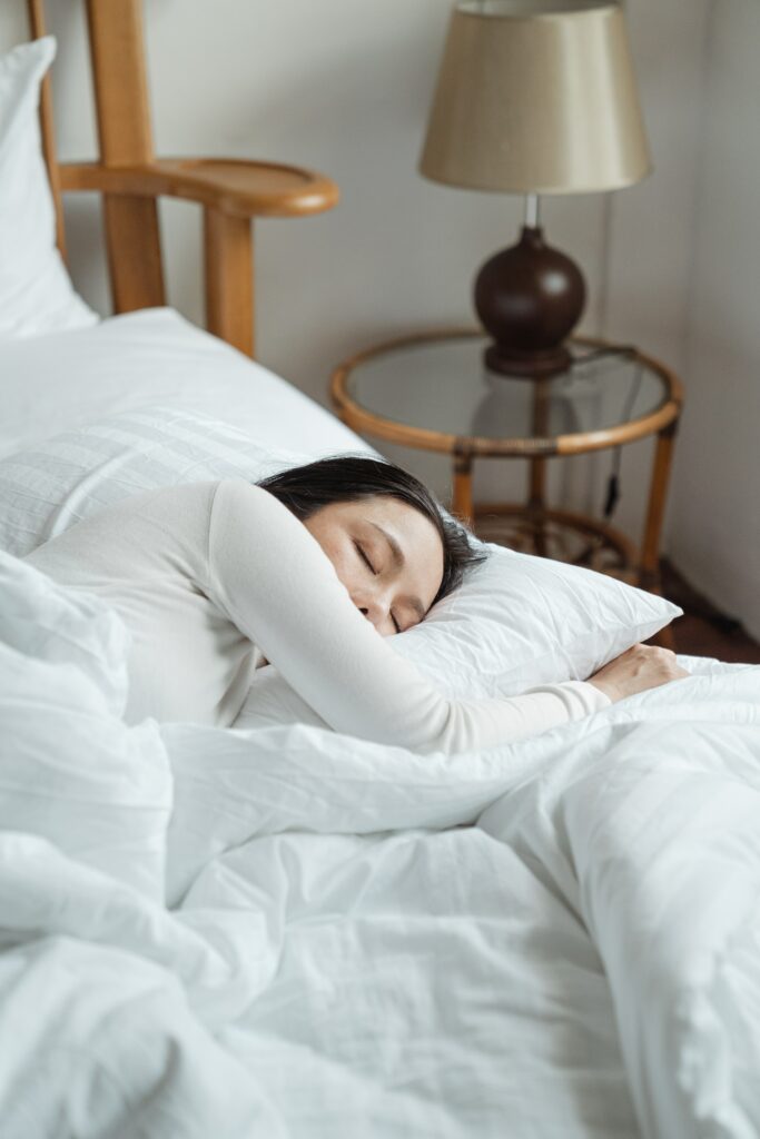 Person sleeping soundly in bed