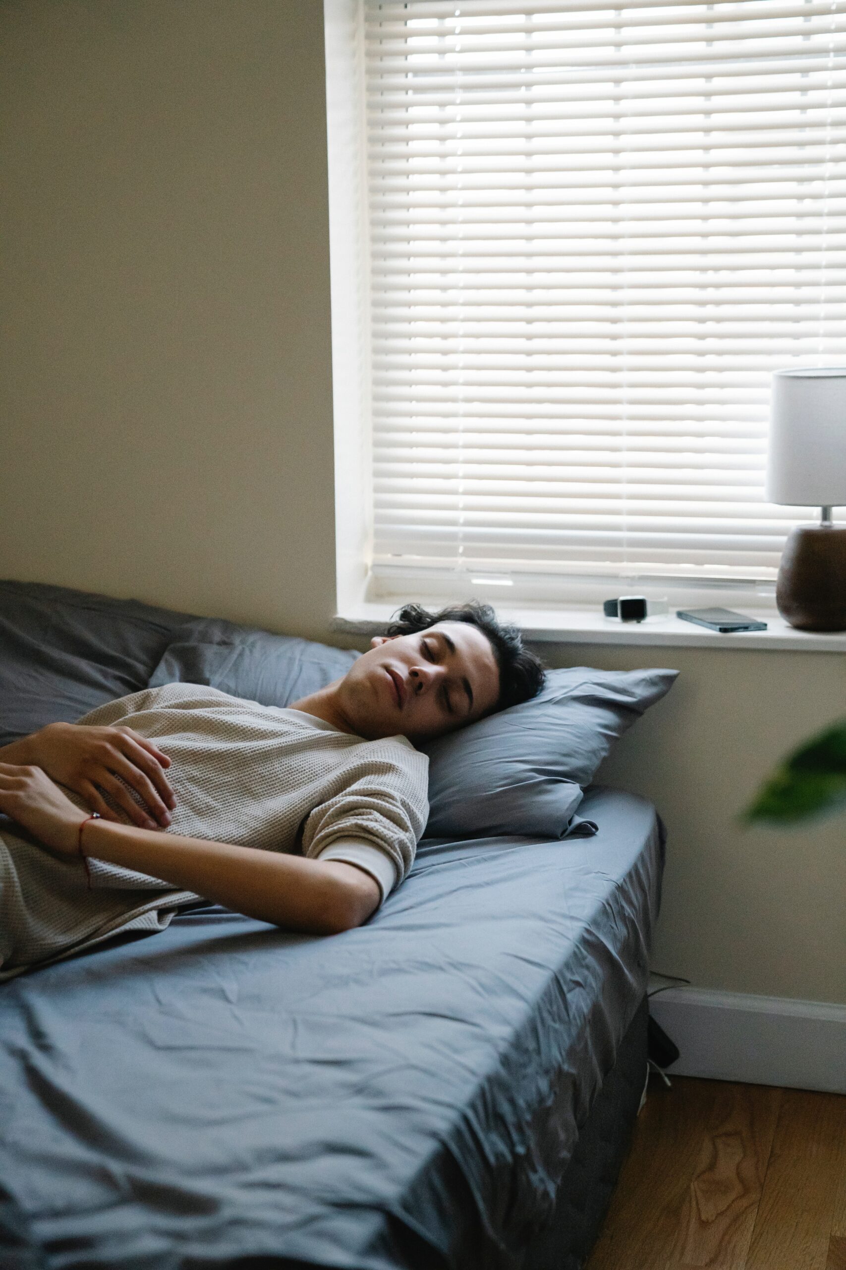 A man lying in bed.