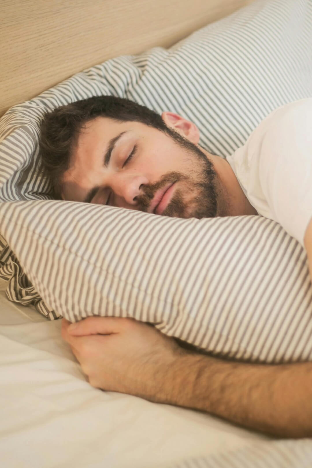 A man sleeping soundly in bed