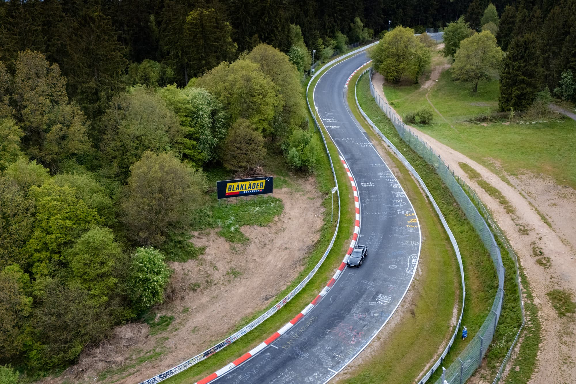 Aerial drone view of the Nürburgring Nordschleife embedded in the Eifel — venue of the 24 Hours race