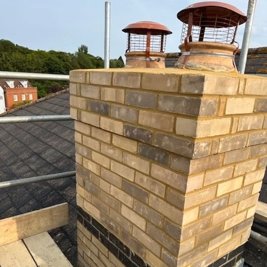 Scaffolding put up around a chimney stack