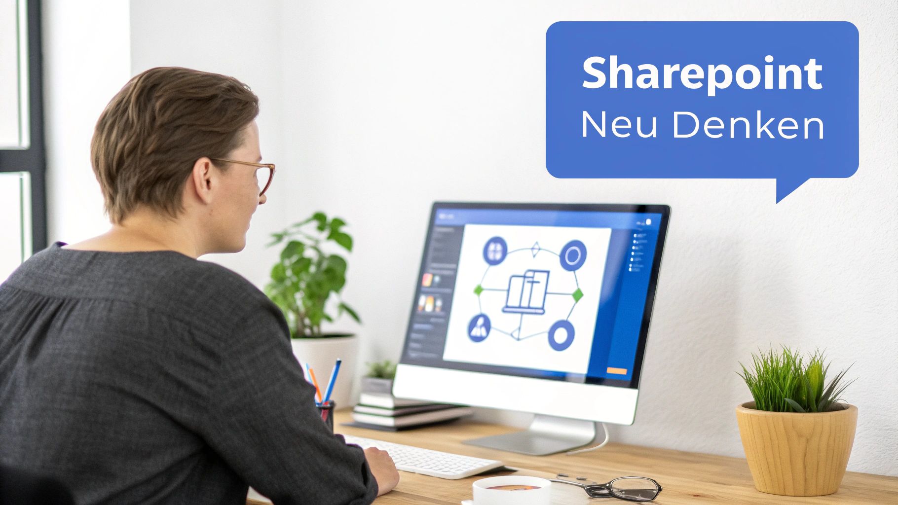 Mann arbeitet am Computer mit SharePoint-Diagramm und Workflow-Visualisierung auf dem Bildschirm