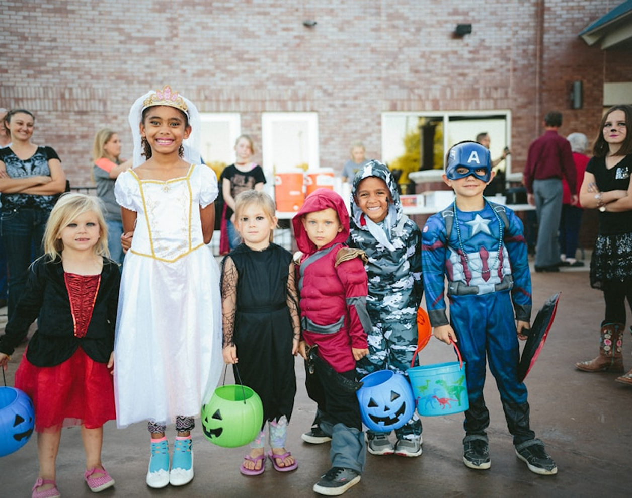 A group of hollam private tutors children standing next to each other.