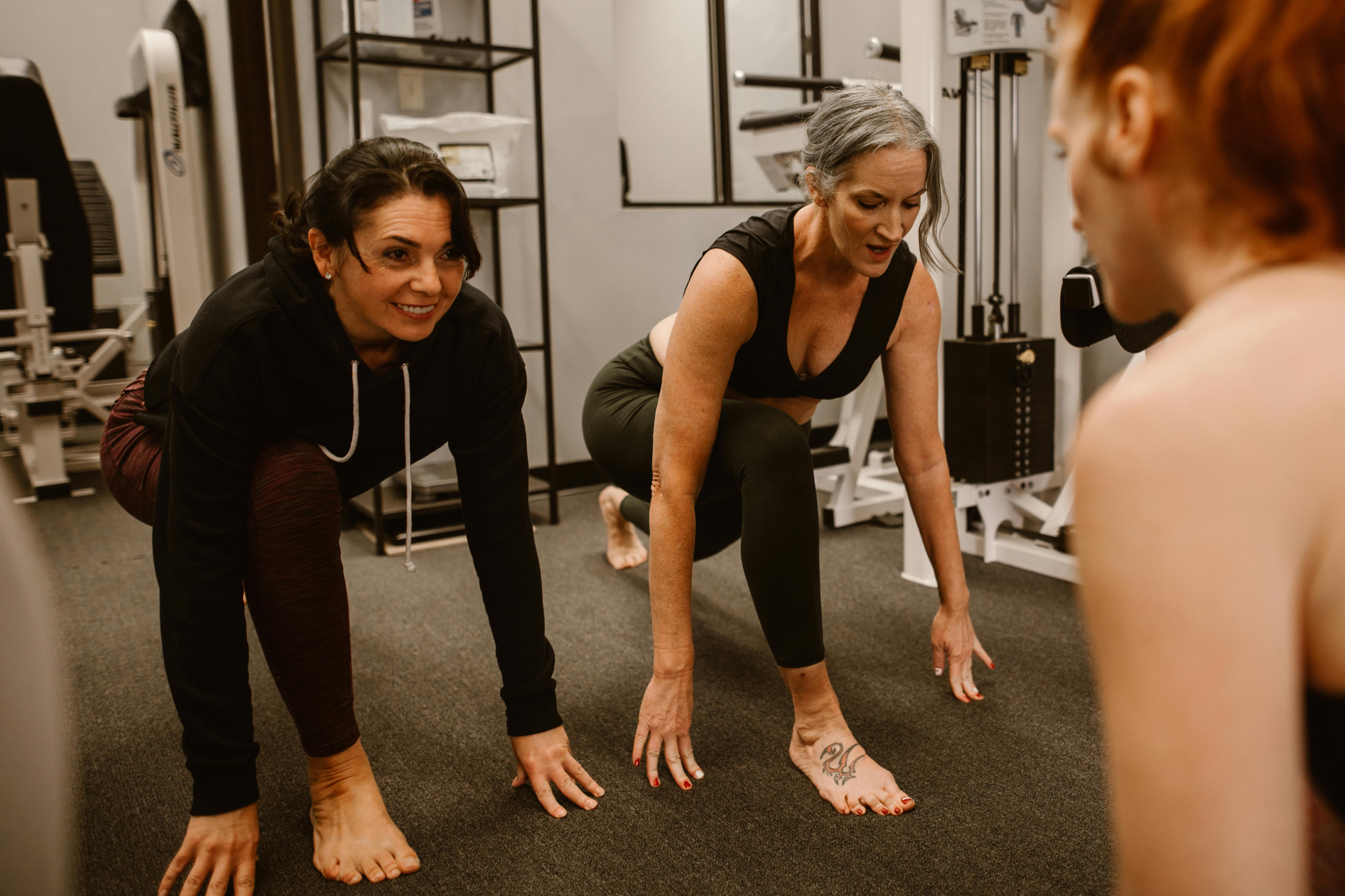 group of people strength training and Inspire Health and Fitness