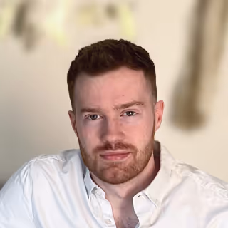 Smiling headshot of Simon Barker