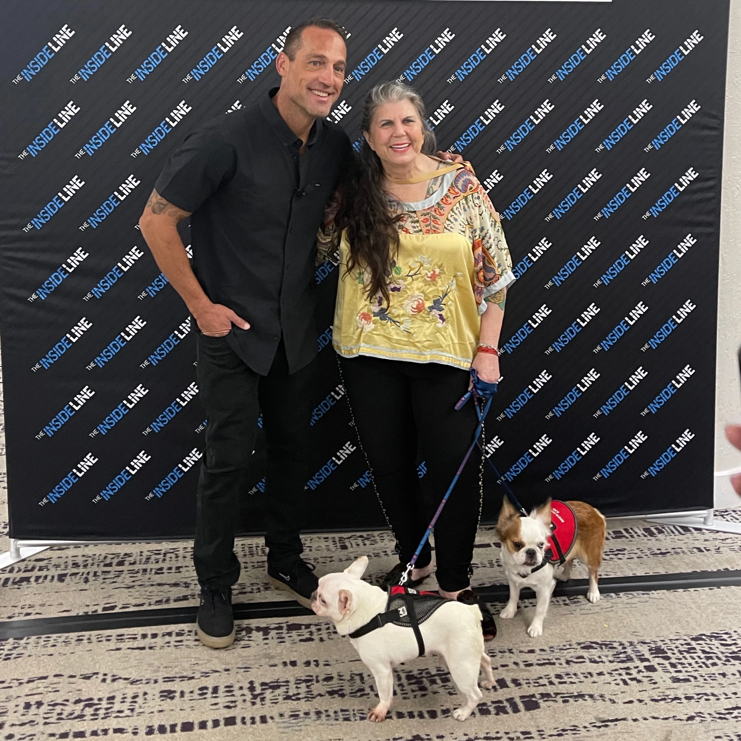 Anahata Graceland posing at an event with two Royal Frenchel service dogs.