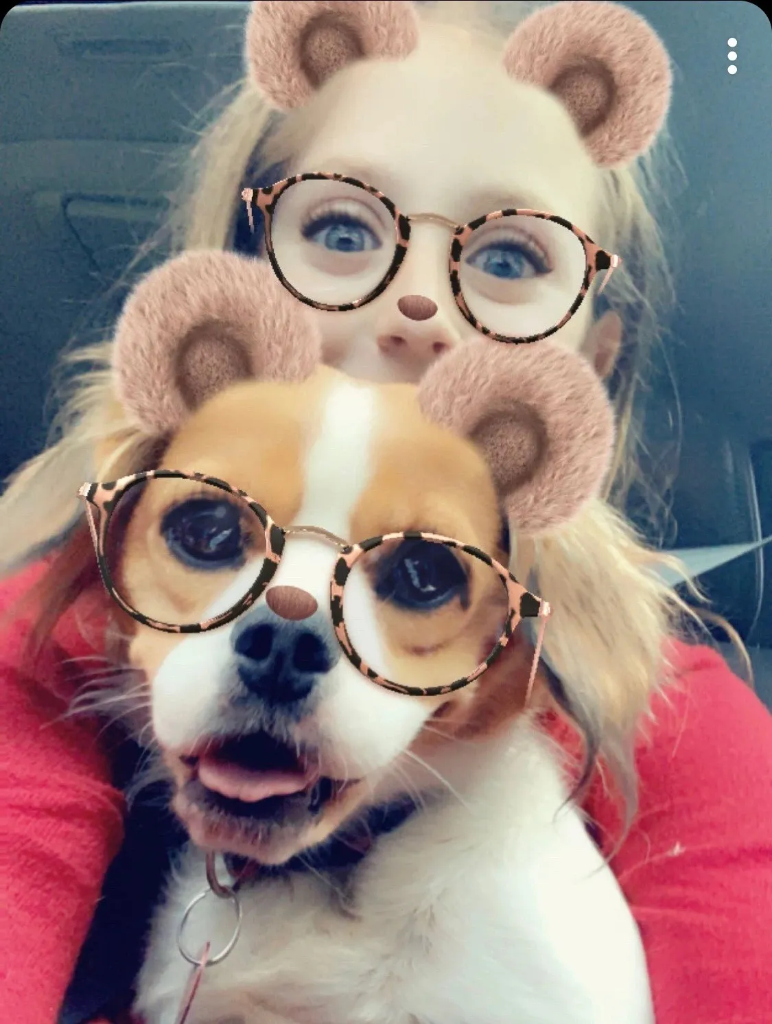Owner and Royal Frenchel posing together with a playful face filter.