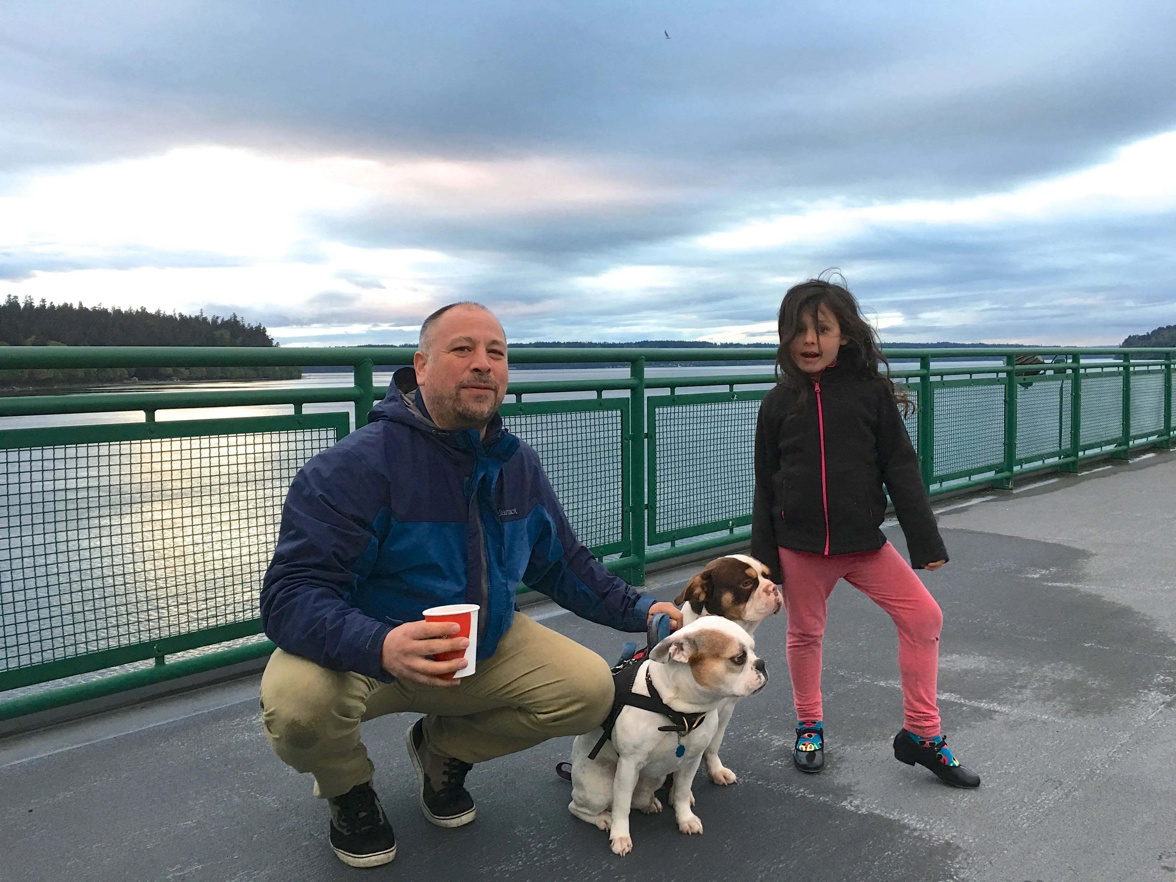 Family standing by the water with a Royal Frenchel.