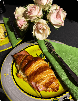 A Croissant with ham and cheese