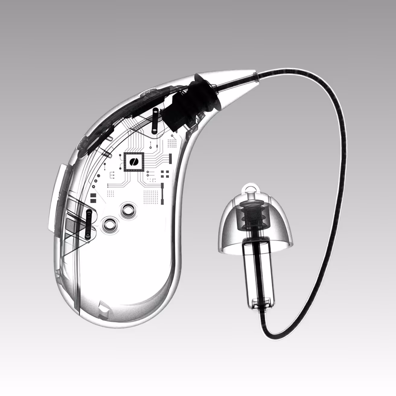 X-ray style image of a hearing aid showing internal electronic components and the attached earpiece.