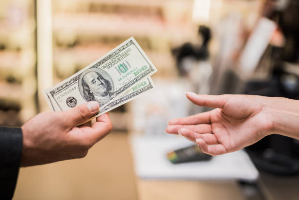 Us Currency Paying Stock Photos
