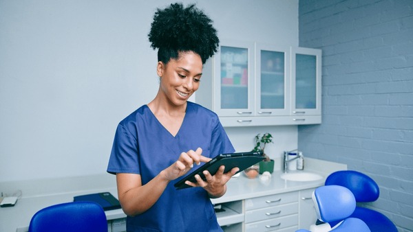 Dental Hygienist Keeping Records