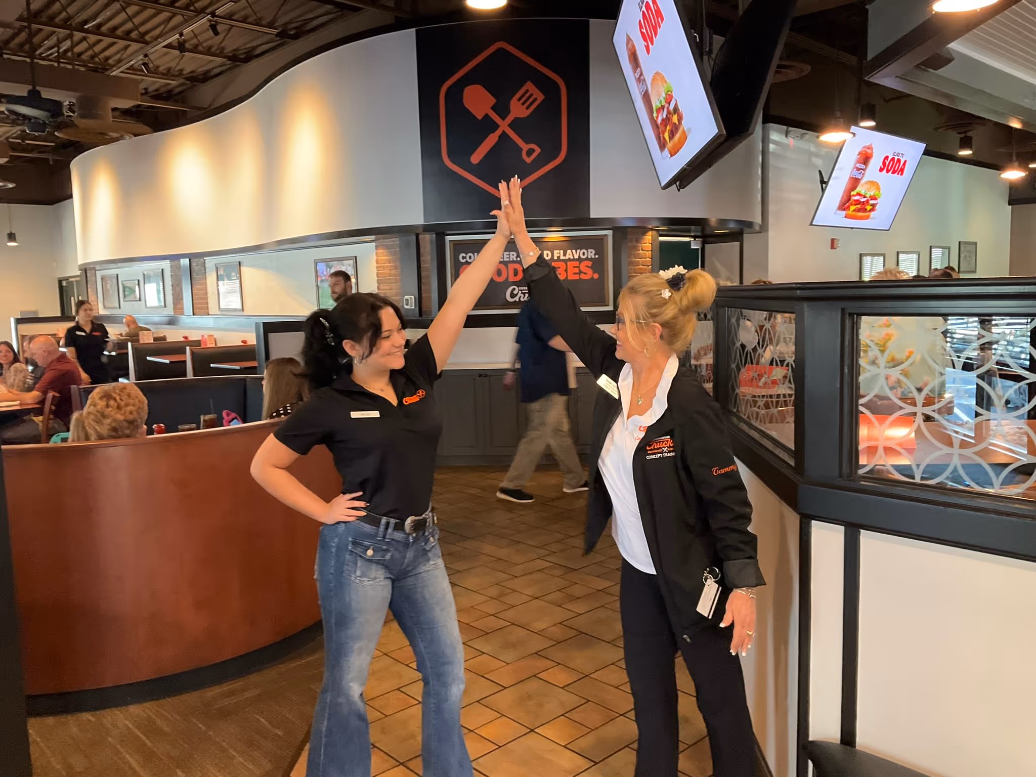 Two People High-Fiving