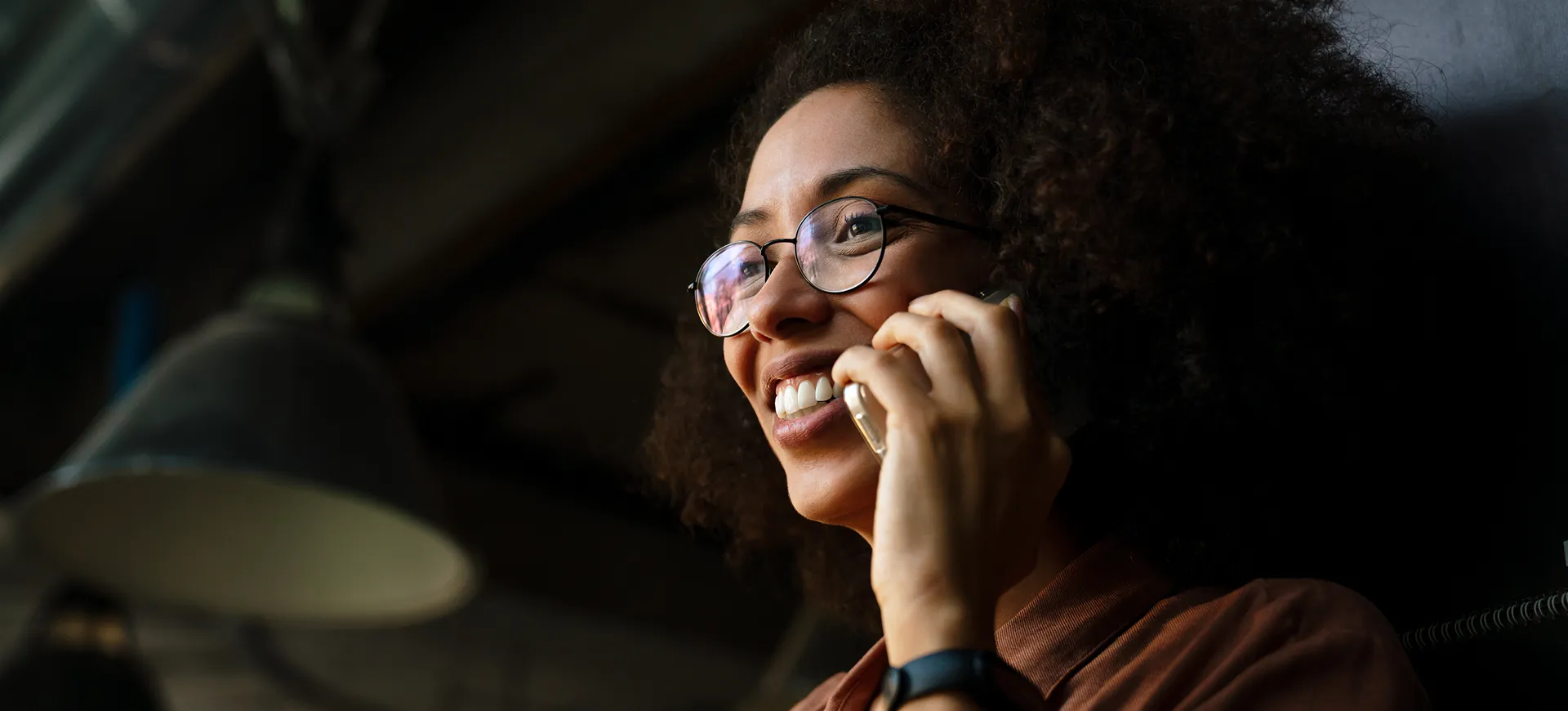 Image of a woman on the phone during a consultation.