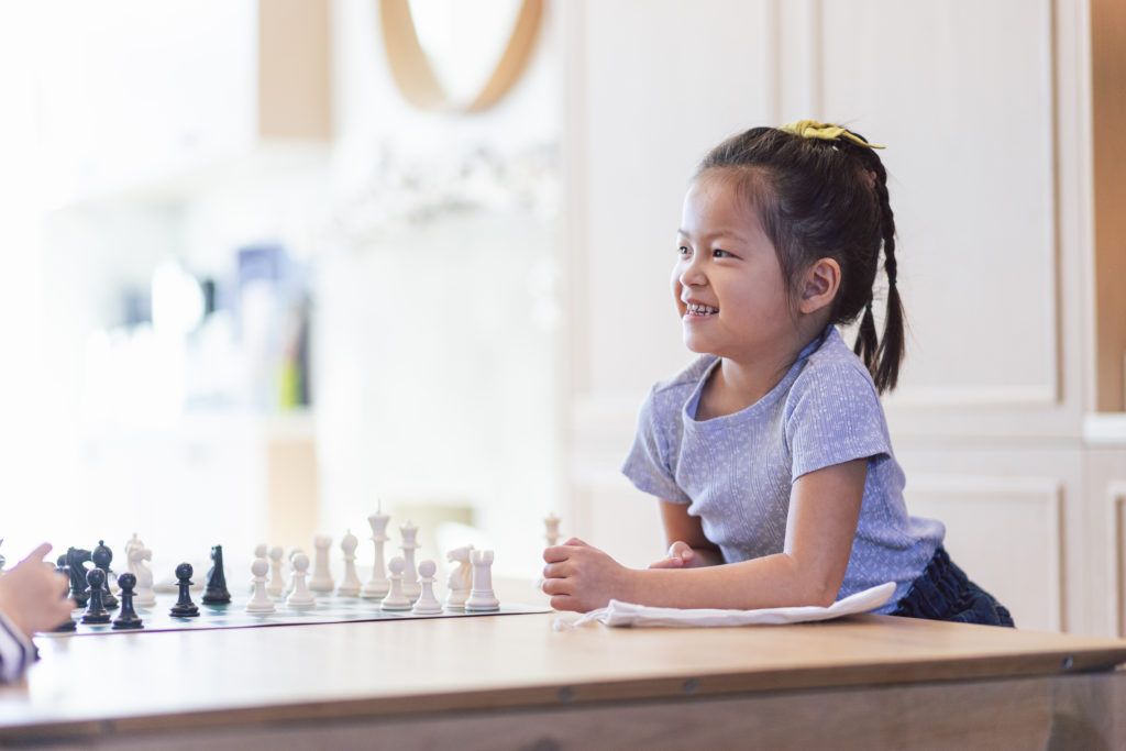 Girl playing chess