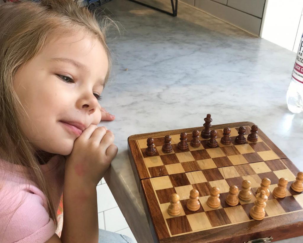 child playing chess 