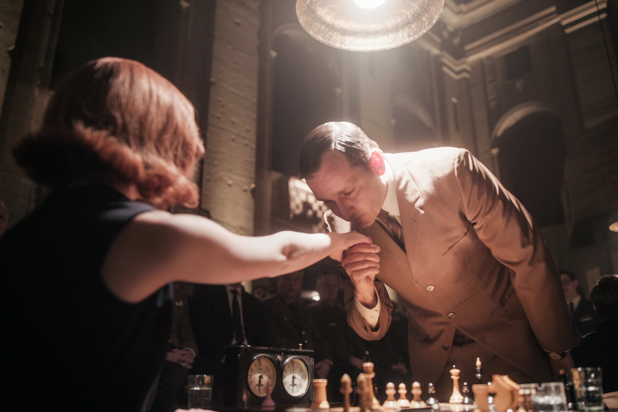 Beth playing chess 