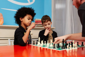 Kids playing chess