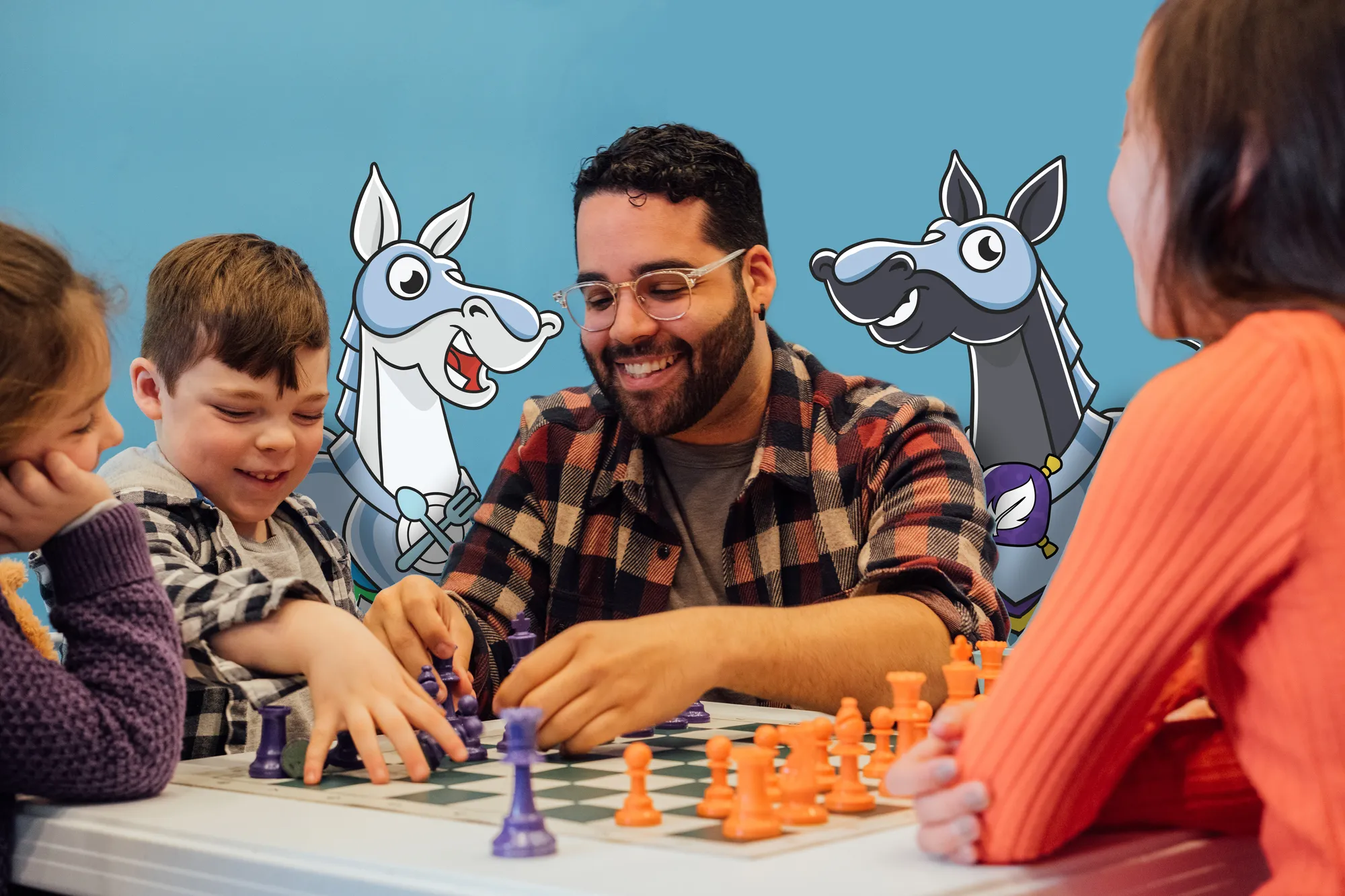 Nick teaching chess to children group