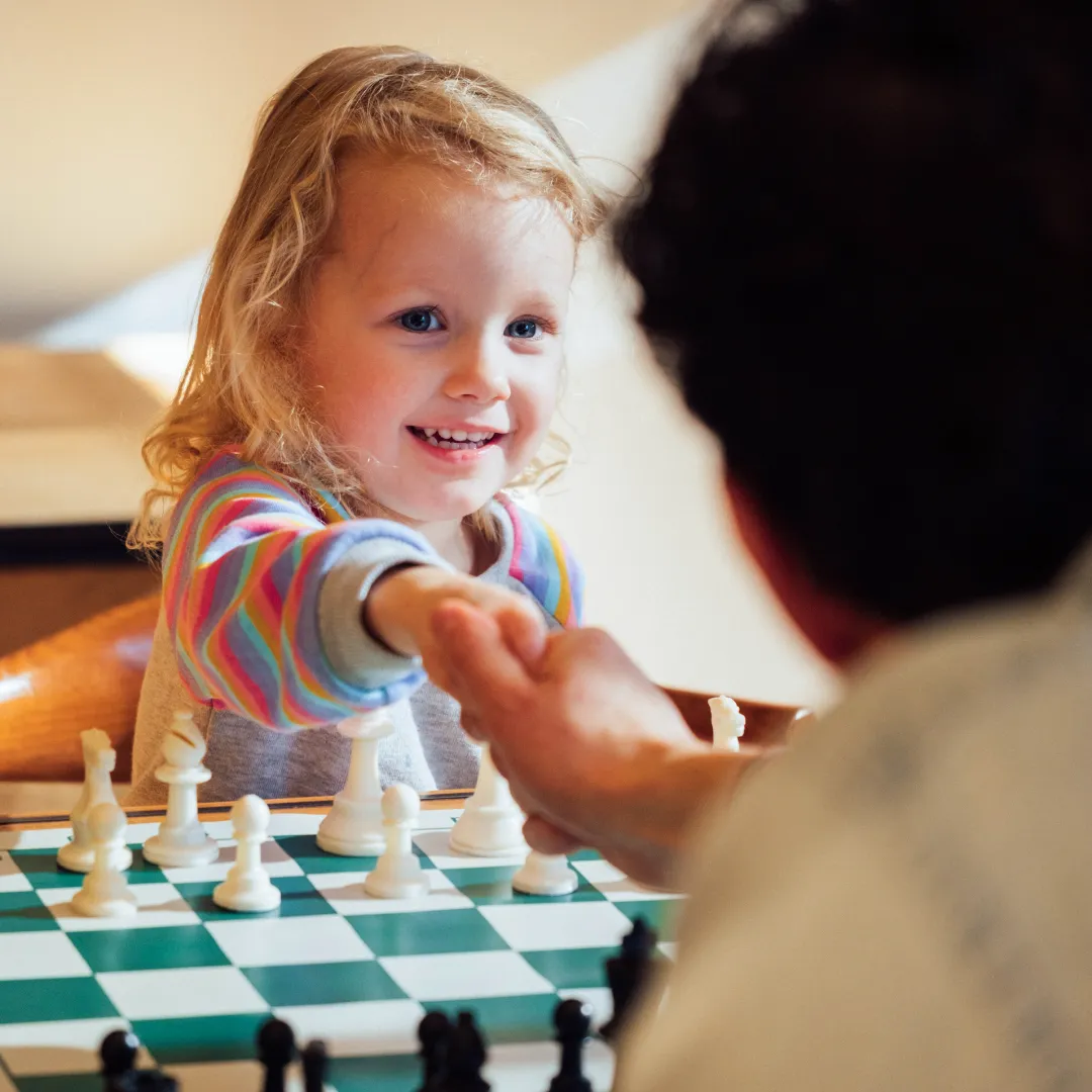 Teach good sportsmanship by shaking hands and saying 'good game' after every chess match