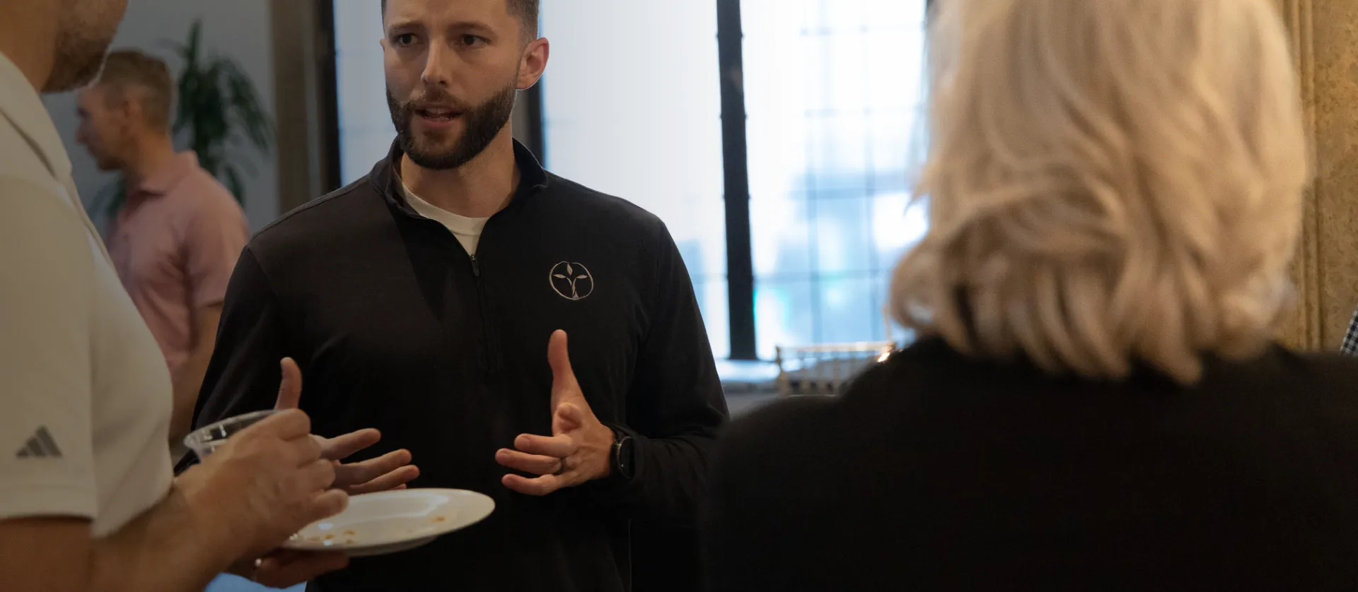 branches worldwide ambassador explaining to others
